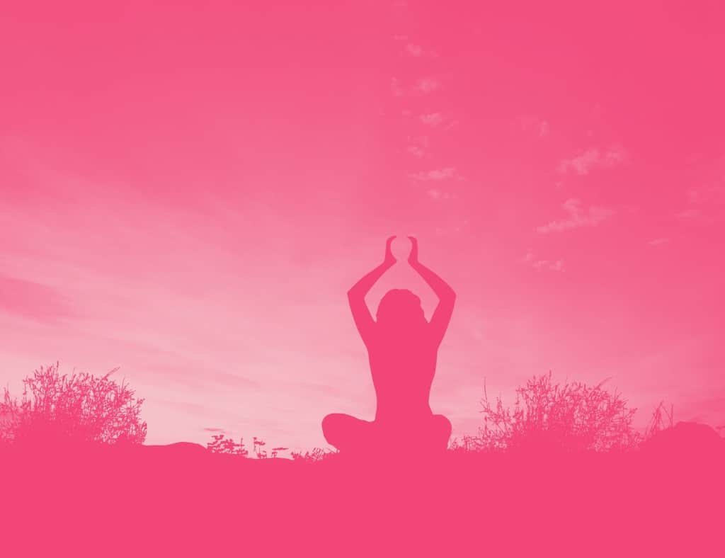 silhouettes of yogi in pink background