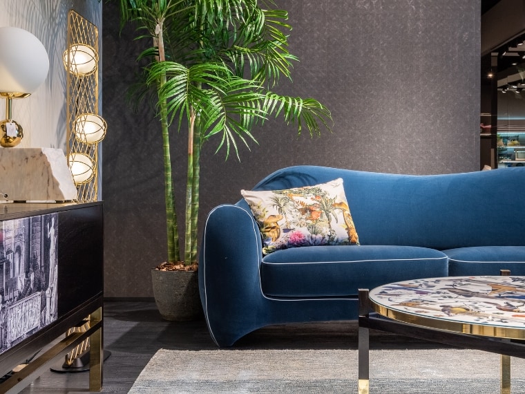 stylish living room with cozy royal blue sofa