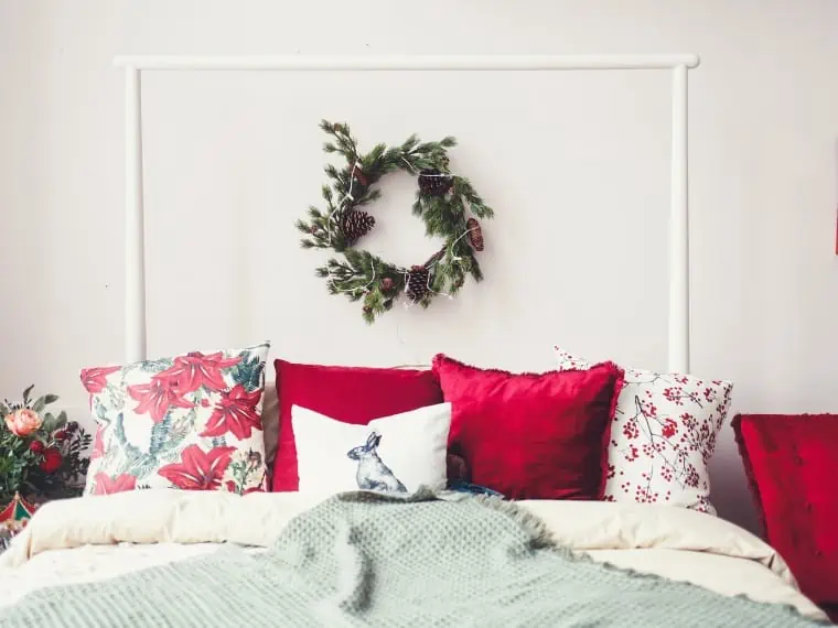 green sage, cream and red burgundy bedroom