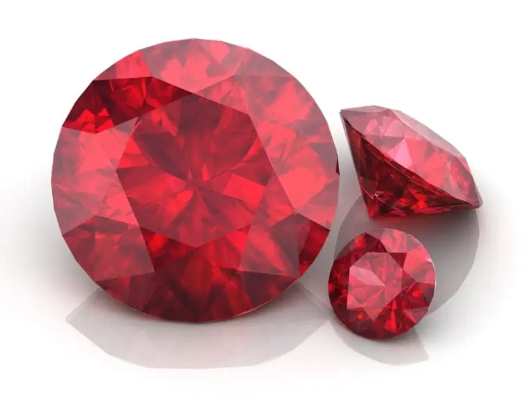 Ruby gemstones on white background