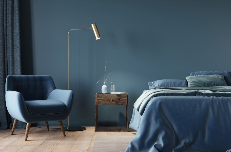 Blue is one of the most stunning colors that match brown in a bedroom design
