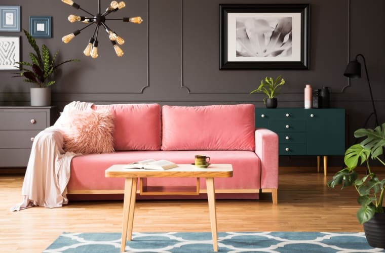 a living room with pink, brown and dark eggplant