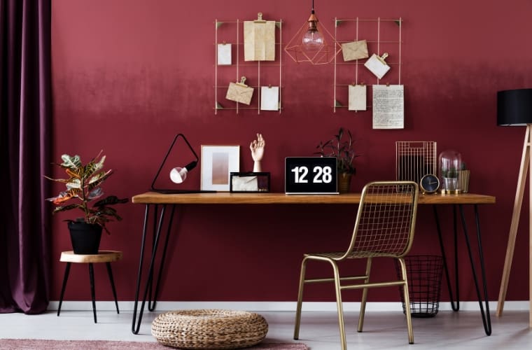 dark red goes well with brown and gold accents in interior design