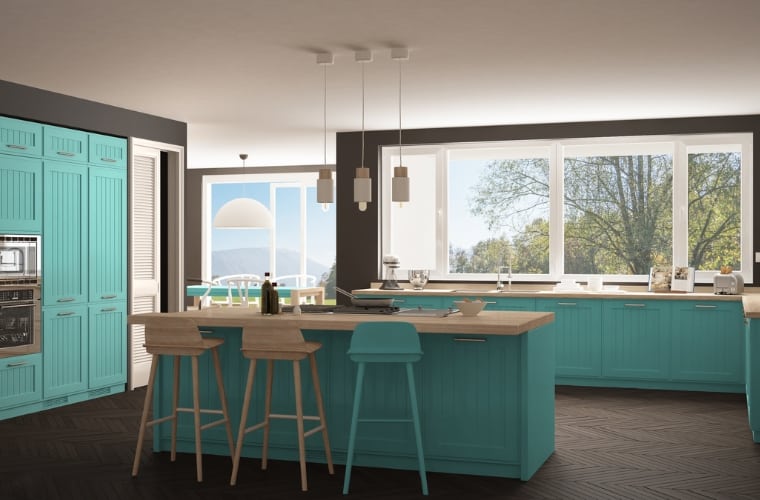 a turquoise and dark brown kitchen