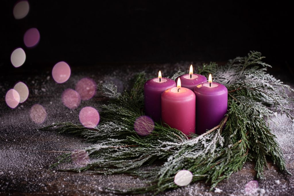 wreath with four purple candles