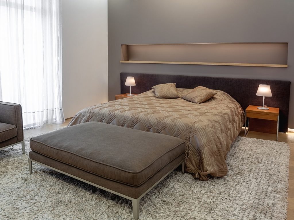 A cozy bedroom in taupe colors